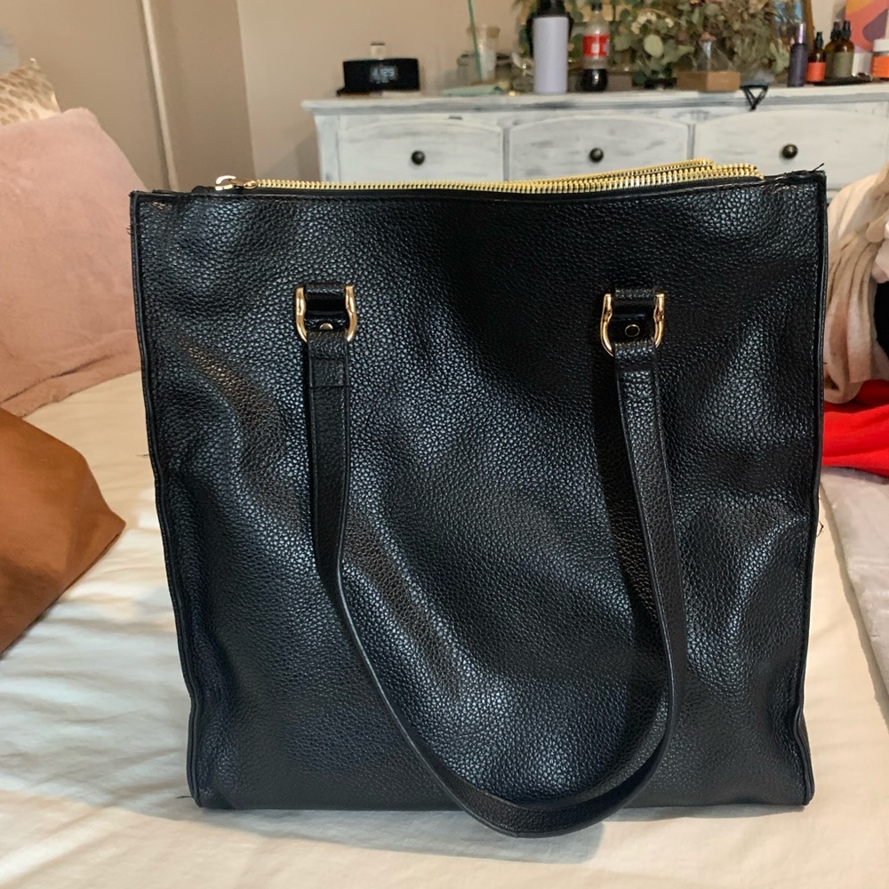 “a new day” black square bag